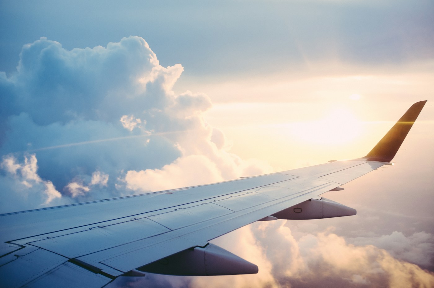 Aircraft wing and aerodynamic control surfaces above the clouds